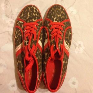 Coach sneakers with cheetah and red detail