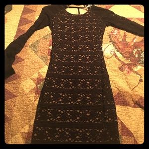Bebe form fitting black lace dress