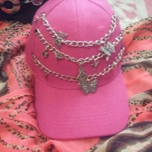 Pink hat with charms