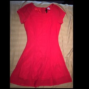 Red fitted mini dress.