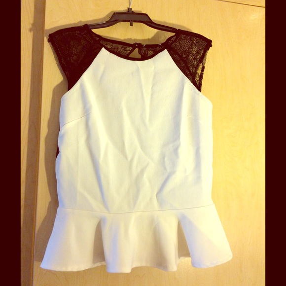 White peplum shirt with black lacy back