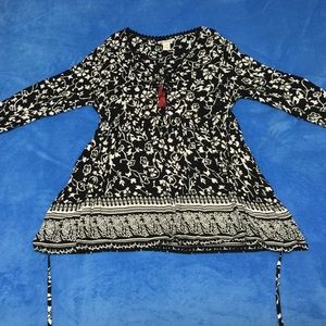 Rayon tunic with tie back at waist.