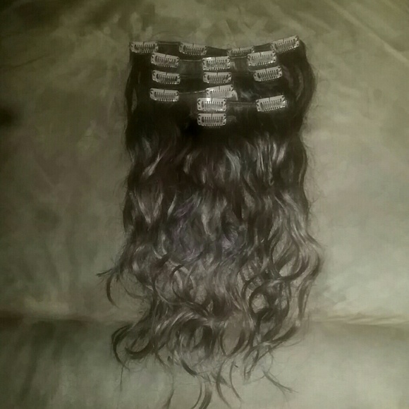 Brown 100% human hair extensions.
