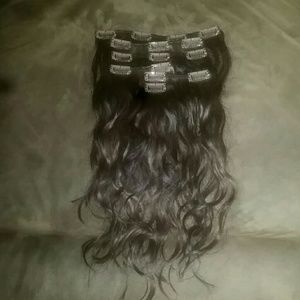 Brown 100% human hair extensions.