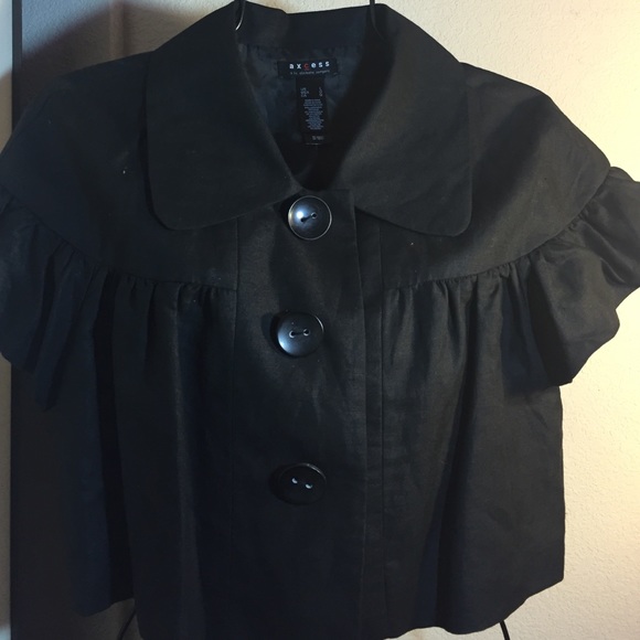 Lovely in black blazer or top