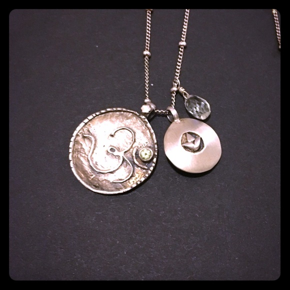 Silver lotus, om, and green topaz necklace
