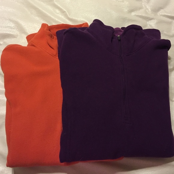 Two Women's fleece zip ups