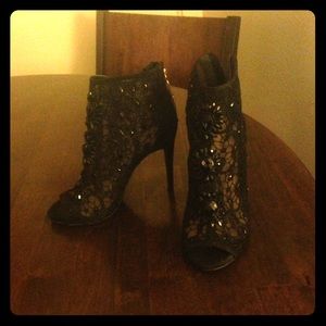 Bebe mesh and rhinestone covered bootie heels.