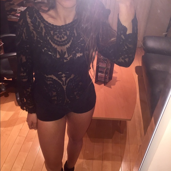 Sheer black top with designs