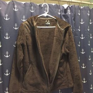 Brown North Face jacket and Old Navy tops