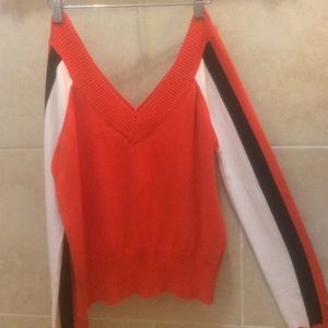 Long shelve, orange, black and white shirt