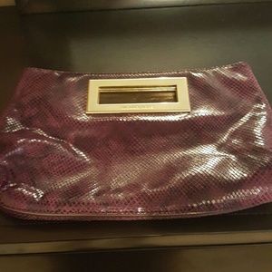 Snake embossed Michael Kors clutch