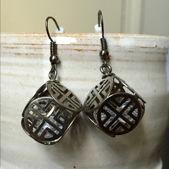 Geometric lattice pattern dangling cube earrings