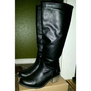 black tall riding boot :make me an offer: