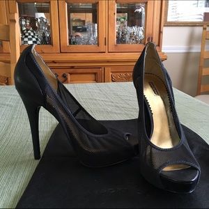 Report Signature black fishnet pumps