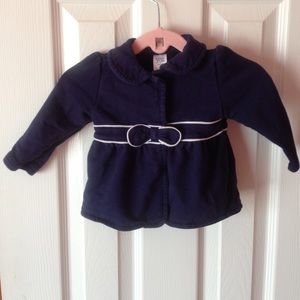 Navy blue and white trim pea coat