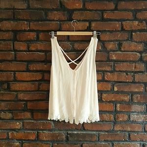 Light pink camisole with embroidery on the bottom