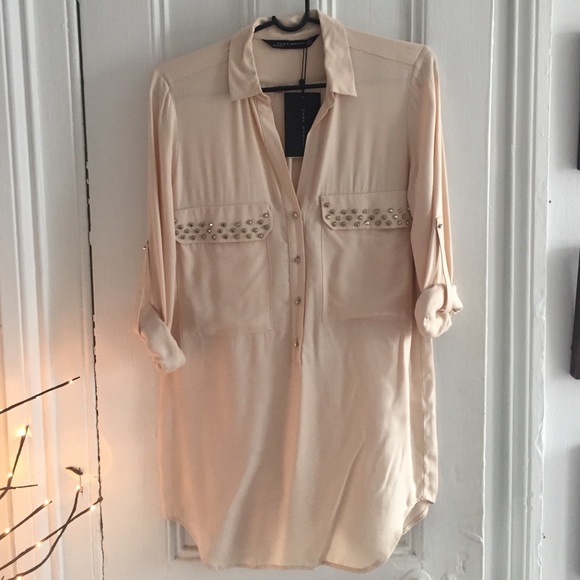 ZARA cream blouse with stud accents.