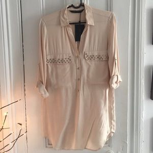 ZARA cream blouse with stud accents.