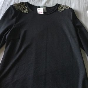 Black top with cute shoulder designs