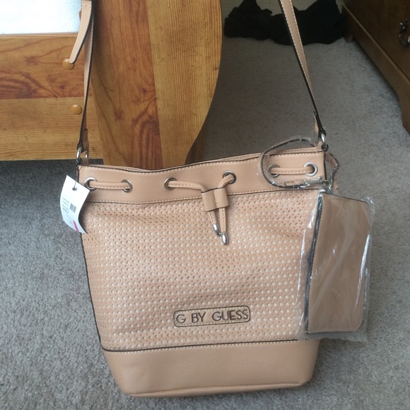 SALE SALE SALE.  BRAND NEW Guess purse