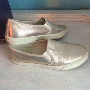 Gold slip on shoes