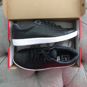 Men's Nike shoes in black leather