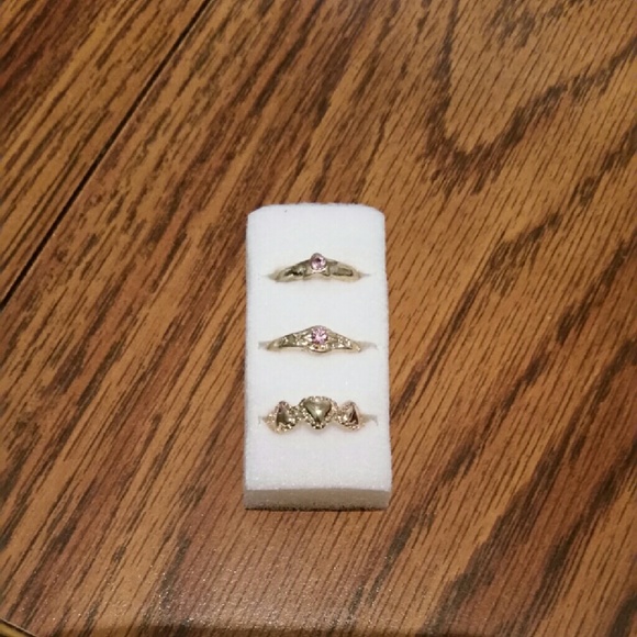 3 gold tone toe rings with pink stones