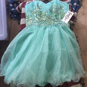 Steppin' Out formal dress. Never worn.