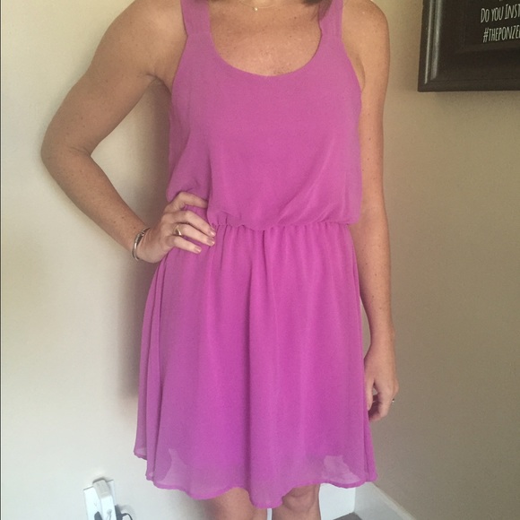 Size small purple chiffon dress with fun back!
