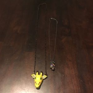 Cute giraffe, and owl necklaces.