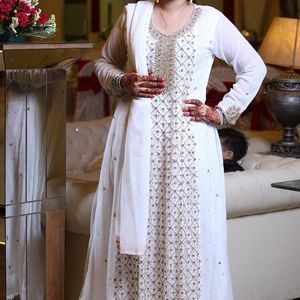 White and golden Pakistani wedding wear