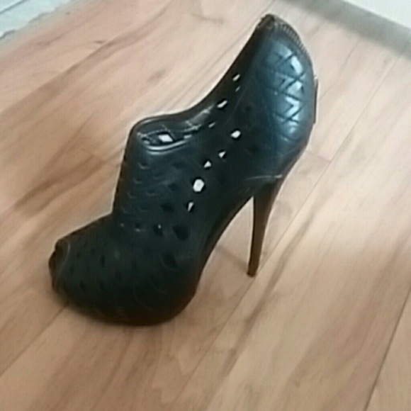 Carlos Santana Black Heels.