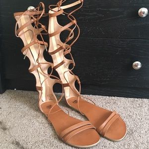 never worn, below the knee, gladiator type sandals