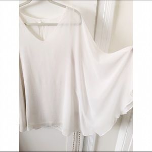 Beautiful chiffon winged-sleeve mini dress.