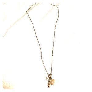 Long chain gold necklace