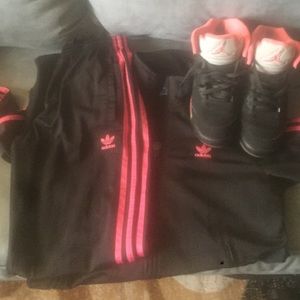 Adidas track suit and pair of air Jordens 28