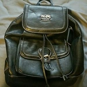 Black leather Coach backpack/purse