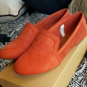 Perforated suede flats