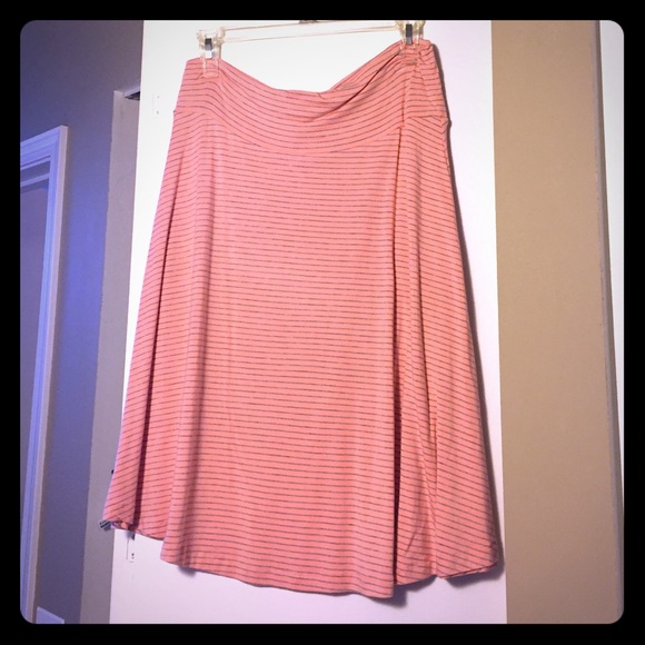 Pink skirt with silver pinstripes.