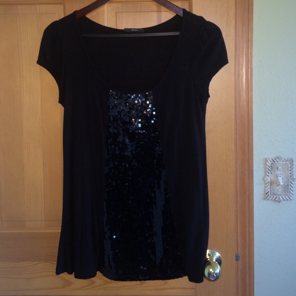 Black cotton top with sequins in center.