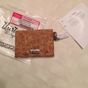 Letters from London in tan metallic cork