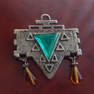 Retro Mayan style pin.