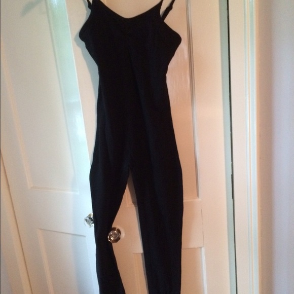 Black athletic jumpsuit.