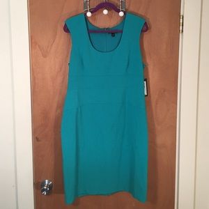 Sleeveless teal business dress