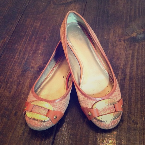 Orange and tan flats with brass accent