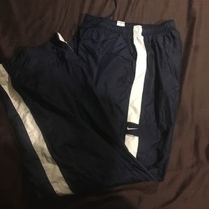 Nike track pants (wind breakers with liner).