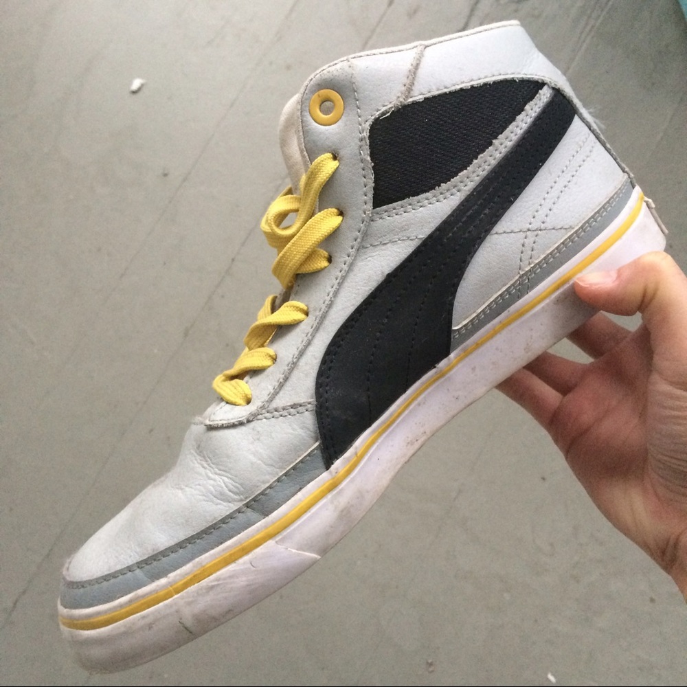 Gray puma high top sneakers