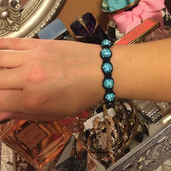 Adjustable blue Swarovski bracelet.