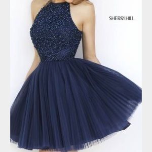Super cute!! Navy blue halter homecoming dress